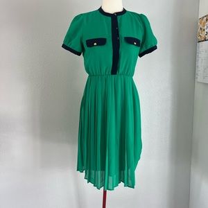 Knee length pleated cap sleeve dress
